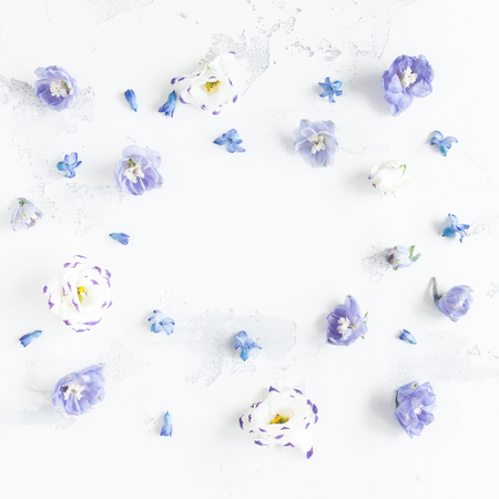 Flowers composition. Frame made of lilac flowers. Flat lay, top view, squareの写真素材