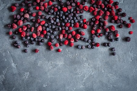 Frozen raspberry, blueberry, cranberryの写真素材