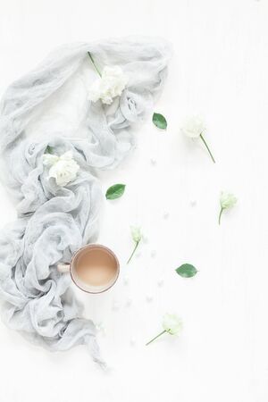 Composition with coffee and white flowers. Flat lay, top viewの写真素材