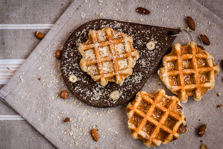 Belgian waffles with grated nutsの写真素材