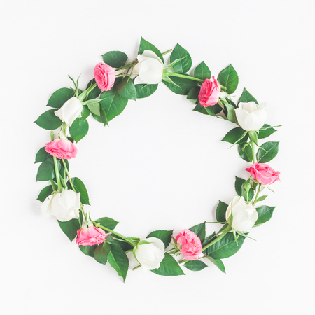 Flowers composition. Frame made of fresh rose flowers. Flat lay, top viewの写真素材