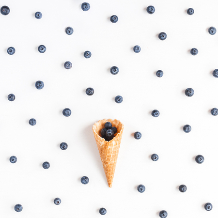 Fresh blueberry in waffle cone. Flat lay, top viewの写真素材