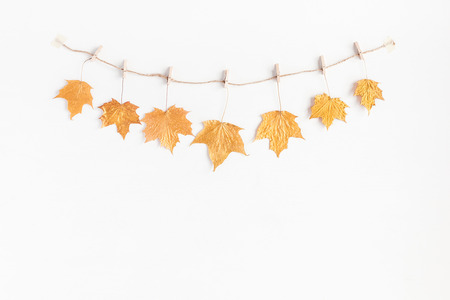 Autumn composition. Autumn maple tree leaves on white background. Flat lay, top view, copy spaceの写真素材