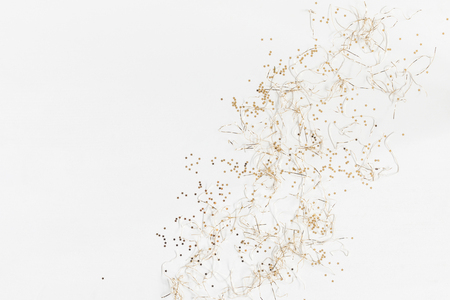 Christmas composition. Pattern made of christmas golden decorations on white background. Top view,...