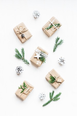 Christmas calendar. Christmas gift, fir branches, pine cones. Flat lay, top viewの写真素材