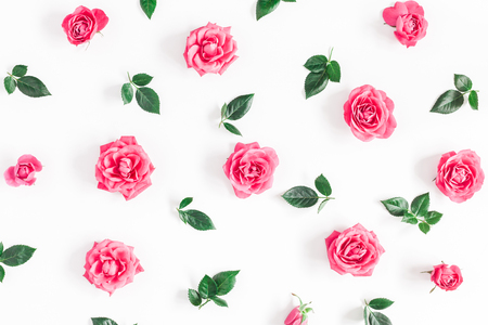 Flowers composition. Pattern made of pink rose flowers on white background. Flat lay, top viewの写真素材