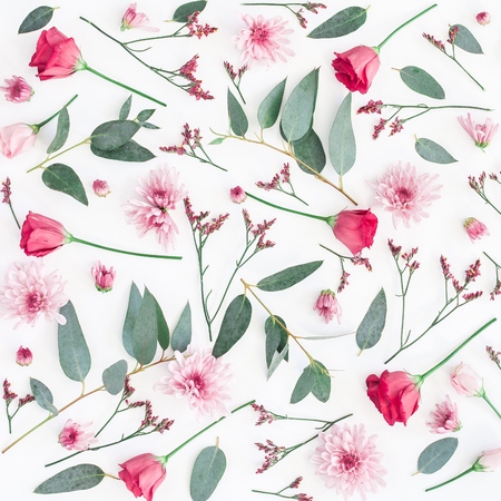 Flowers composition. Pattern made of various pink flowers and eucalyptus branches on white background. Flat lay, top view, squareの写真素材