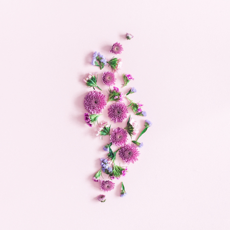 Flowers composition. Pattern made of colorful flowers on pink background. Flat lay, top view, squareの写真素材
