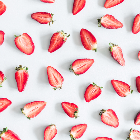 Strawberry pattern on pastel blue background. Summer concept. Flat lay, top view, square