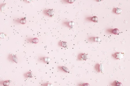 Christmas composition. Christmas pink decorations on pastel pink background. Flat lay, top viewの写真素材