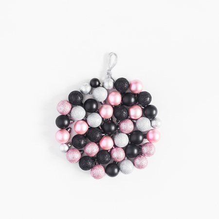 Christmas ball made of black, silver and pink balls on white background. Christmas, winter, new year concept. Top view, flat lay, squareの写真素材