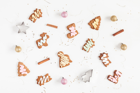 Christmas composition. Christmas gingerbread cookies on white background. Flat lay, top viewの写真素材
