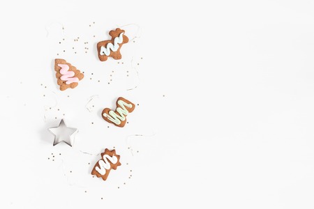 Christmas composition. Christmas gingerbread cookies on white background. Flat lay, top view, copy...