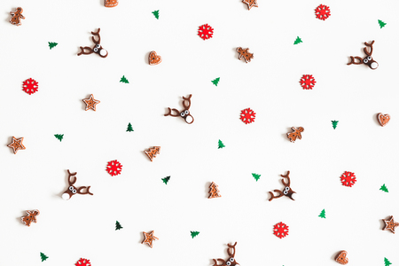 Christmas composition. Pattern made of christmas decorations on white background. Flat lay, top viewの写真素材