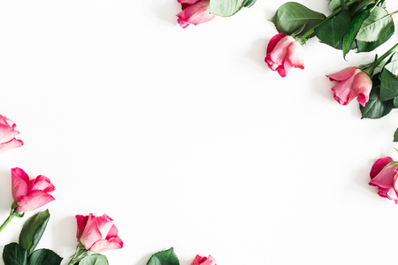Flowers composition. Pink rose flowers on white background. Valentines day, mothers day, womens day concept. Flat lay, top view, copy spaceの写真素材