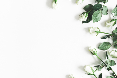 Flowers composition. White rose flowers on white background. Flat lay, top view, copy spaceの写真素材