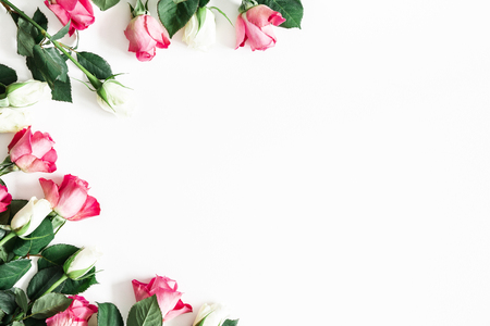 Flowers composition. Pink and white rose flowers on white background. Valentines day, mothers day, womens day concept. Flat lay, top view, copy spaceの写真素材