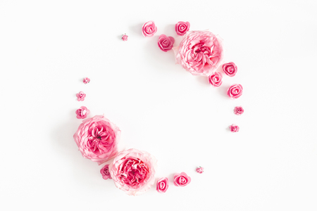 Flowers composition. Wreath made of rose flowers on white background. Valentines day, mothers day, womens day, spring concept. Flat lay, top view, copy spaceの写真素材