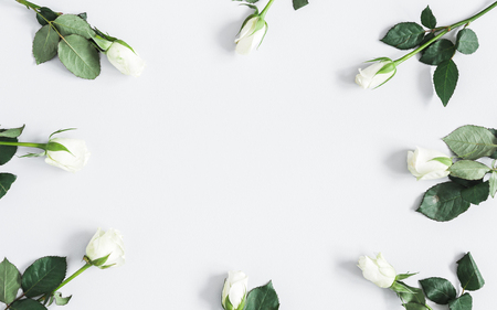 Flowers composition. White rose flowers on pastel gray background. Flat lay, top view, copy spaceの写真素材