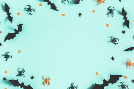 Halloween decorations on blue background. Halloween concept. Flat lay, top view, copy spaceの写真素材