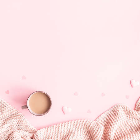 Valentine's Day background. Plaid, cup of coffee on pink background. Valentines day concept. Flat lay, top view, copy spaceの写真素材