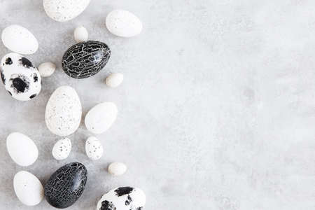 Easter eggs on concrete gray background. Easter concept. Flat lay, top viewの写真素材