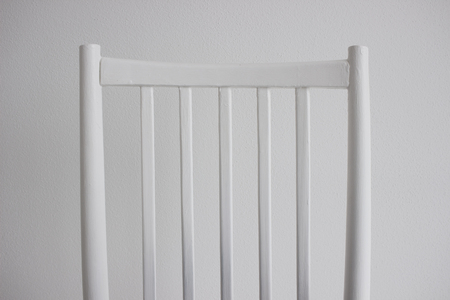 Front of white chair with white backgroudの写真素材