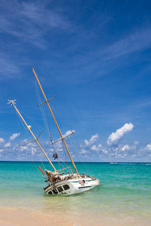 Abandoned shipwreck on the coast at kata beach Phuket Thailand, tourist landmarkの写真素材