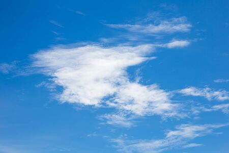 blue sky background with wave cloudsの写真素材