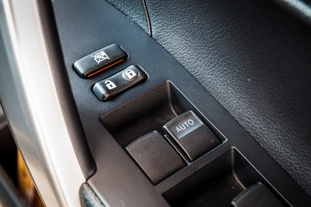 Car window control and adjustment buttons. Focus lock and unlock buttonの写真素材