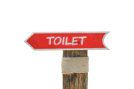 Wooden allow pointer toilet sign for background or text on white isolated. clipping pathの写真素材
