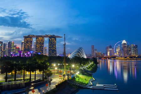 SINGAPORE - NOV 19 2016 : Marina Bay Sands Hotel and Garden by the Bay and singapore flyer it is Symbol or Landmark of Singapore most popular for tourist in twilight time on November 19,2016のeditorial素材