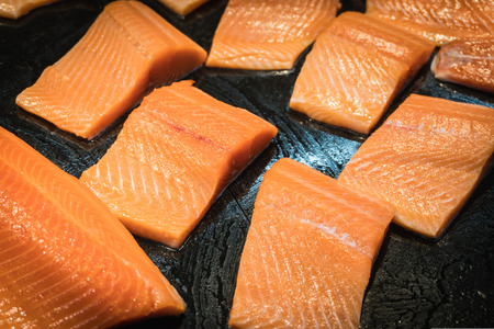 Closeup split salmon inside super market. select focus