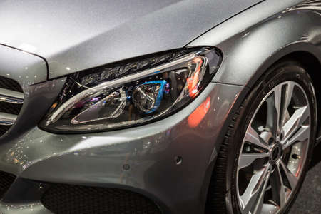 Close up of detail on one of the LED headlights modern and luxury car. Select focus.の写真素材