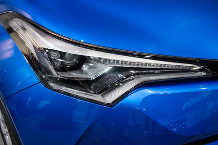 Close up of detail on one of the LED headlights modern and luxury car. Select focus.