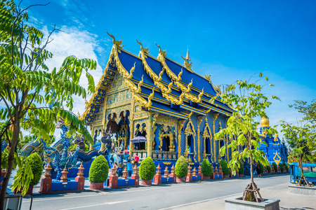 Wat Rong Sua Ten temple with blue sky background, Chiang Rai Province, Thailand, It's a popular destination and Landmark of Chiang Raiの写真素材