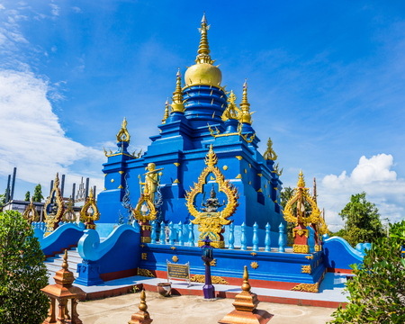 Blue pagoda at Wat Rong Sua Ten temple Chiang Rai Province, Thailand, It's a popular destination and Landmark of Chiang Rai, Translation text in the image "word of worship relics pagoda of buddhism"の写真素材