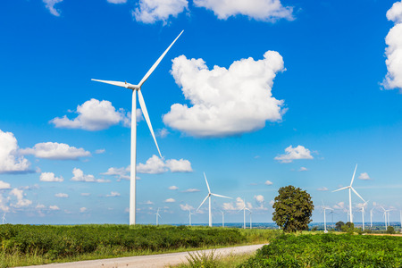 Wind turbine farm in beautiful nature with blue sky blackground, generating electricity in Nakorn...