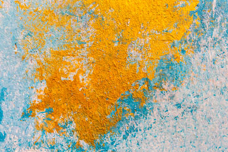Abstract background texture of yellow and blue watercolor paint, the way onto the cement wall