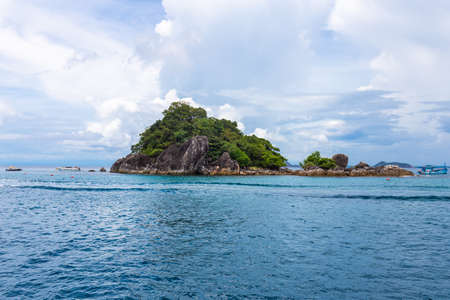 A small island in the middle of the sea for snorkeling at Koh Chang, Thailand.の写真素材