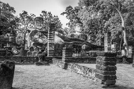 Landmark of Buddha image made of ancient bricks in the Kamphaeng Phet Historical Park, Thailand. Black and whiteの写真素材