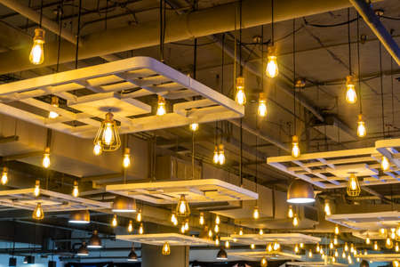 Numerous antique lamps decorate the interior of the building, giving off a warm yellow glow.