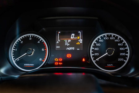Modern car instrument dashboard panel with digital and analog screen or speedometer and symbol in...