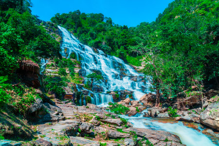 Amazing deep forest big waterfall at Mae Ya waterfall, Doi Inthanon national park Chiangmai, Thailand. Translate text " Mae Ya waterfall "の写真素材
