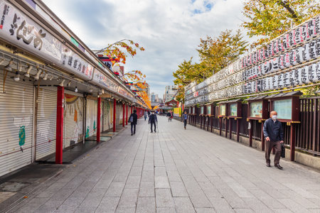 Asakusa, Tokyo, Japan - November 13, 2023 : The walkway to Sensoji Temple in Asakusa has many shops on both sides in the morning.のeditorial素材