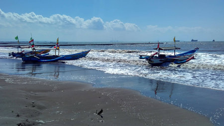 Fishing Boat at Teluk Penyu Beachの写真素材