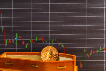 The value of bitcoin has seen significant losses.Bitcoin price going down conceptの写真素材