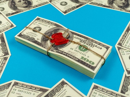 Prop Money Dollars.Full Print Old Style.100 Dollar Bills. Sealed brick with sealing wax and rope.の写真素材