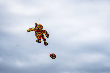 Bedford,Bedfordshire,UK,June 2,2019. Kites flying in the sky among the clouds.Bedford International Kite Festival.のeditorial素材
