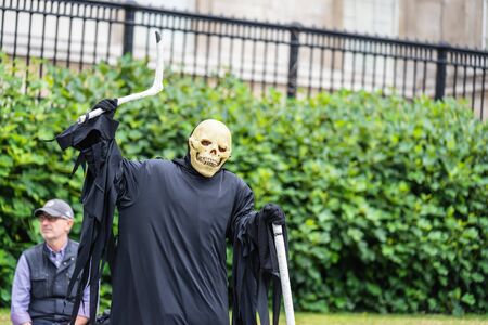 London, Londons West End in the City of Westminster, UK, July, 2019. Floating death. Street artist